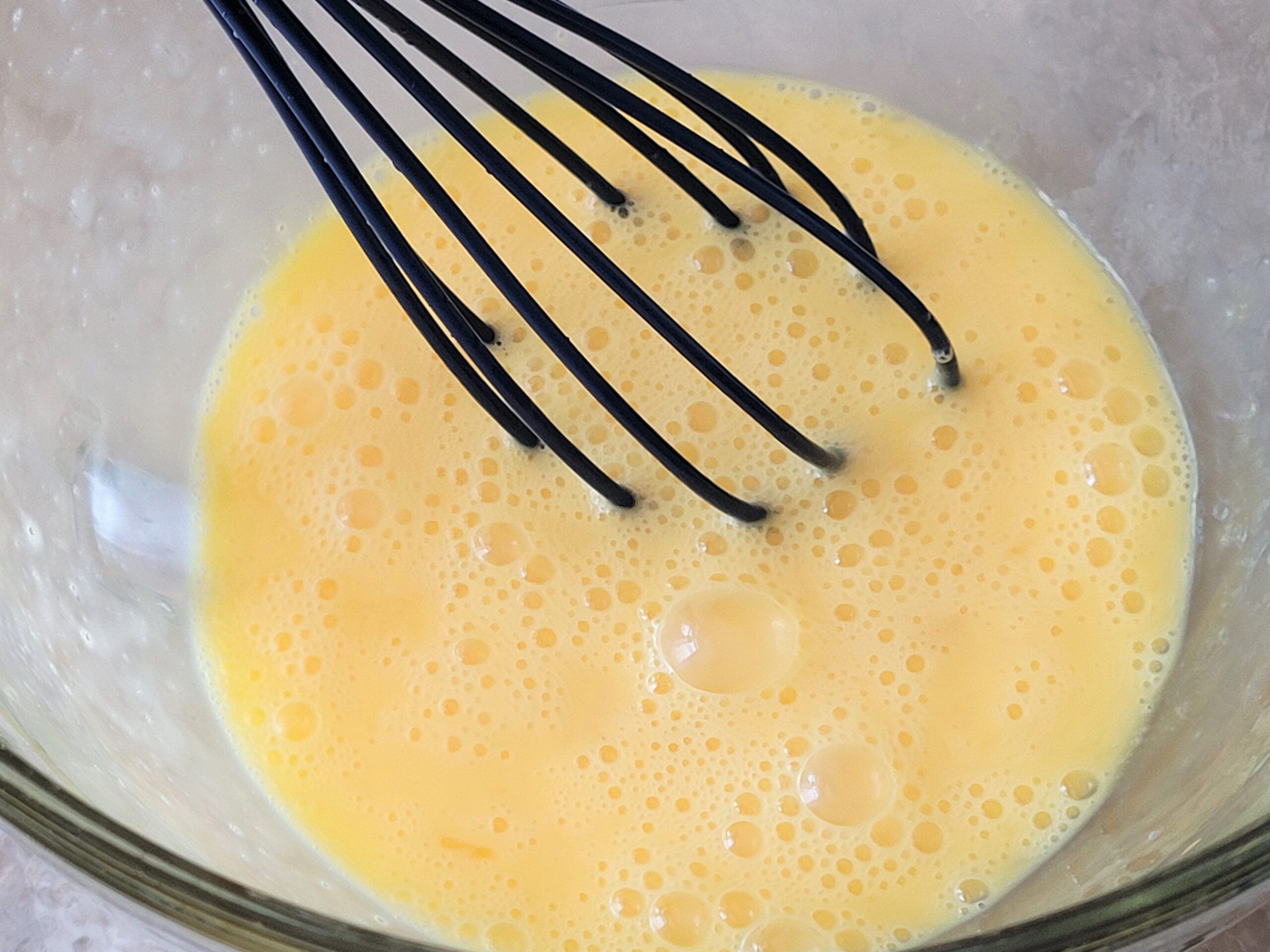 Whisk the eggs and set aside.
