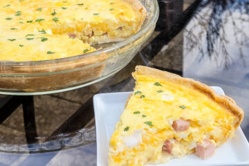 A slice of quiche is perfect for Mother's Day, Easter, breakfast, or brunch.