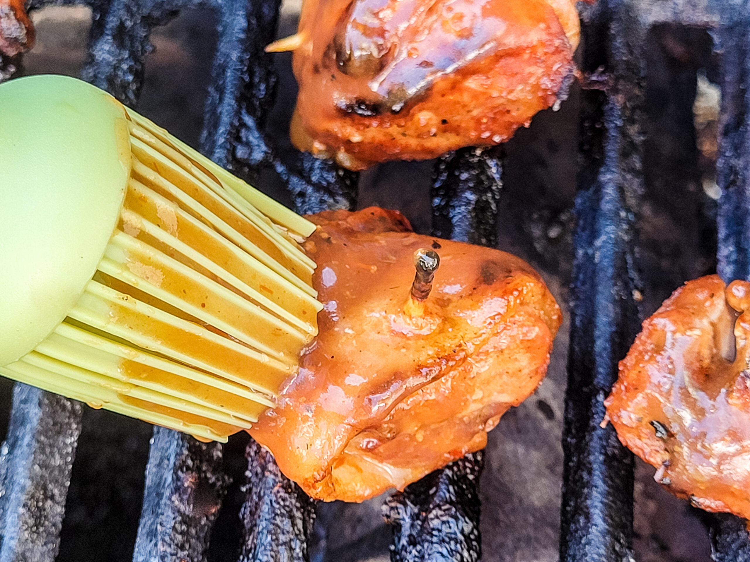 Brushing Pork with Sauce Brush with BBQ sauce and grill another minute.