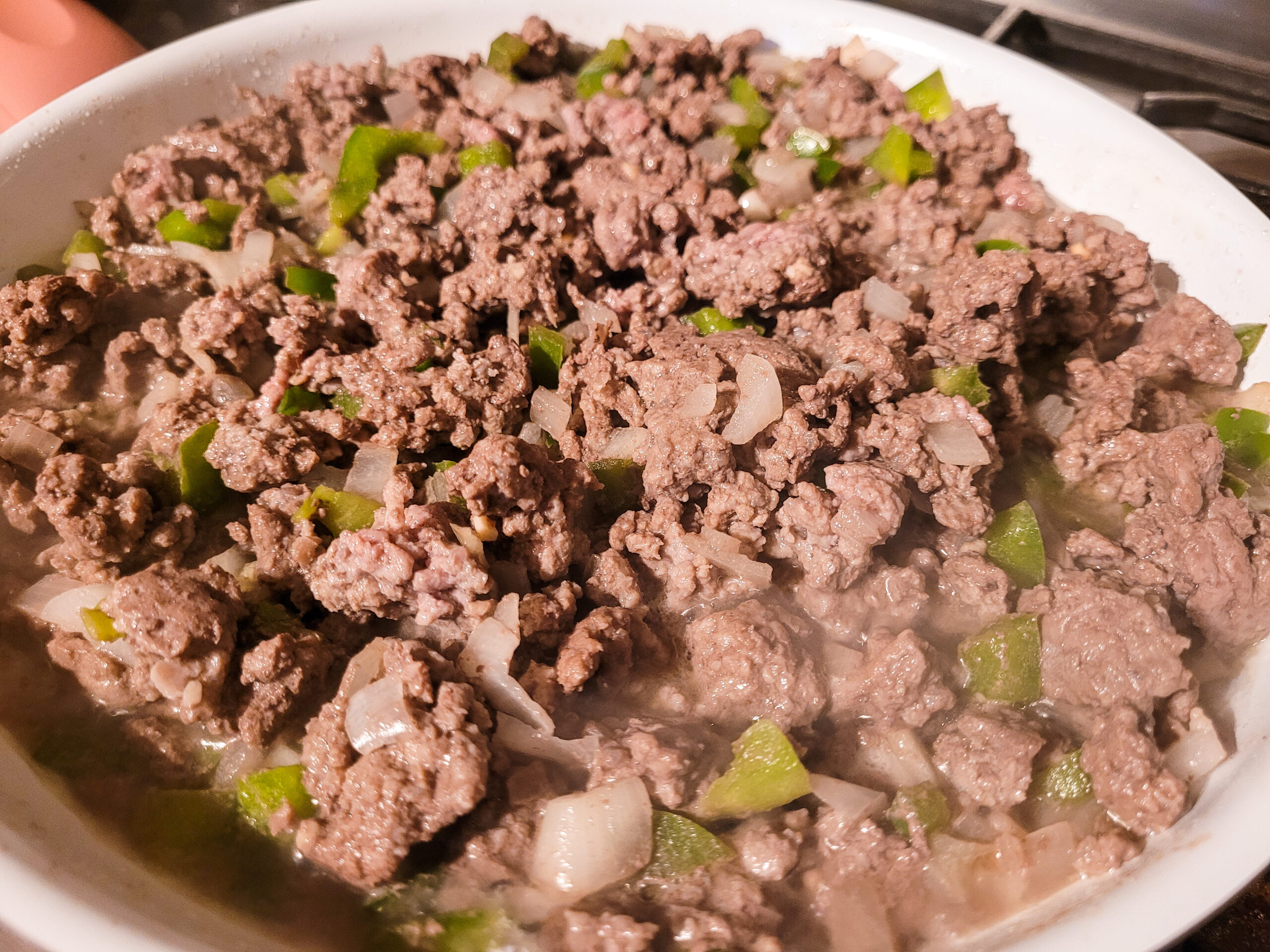 Browning Ground Beef Brown the ground beef, onion, green pepper, and garlic.