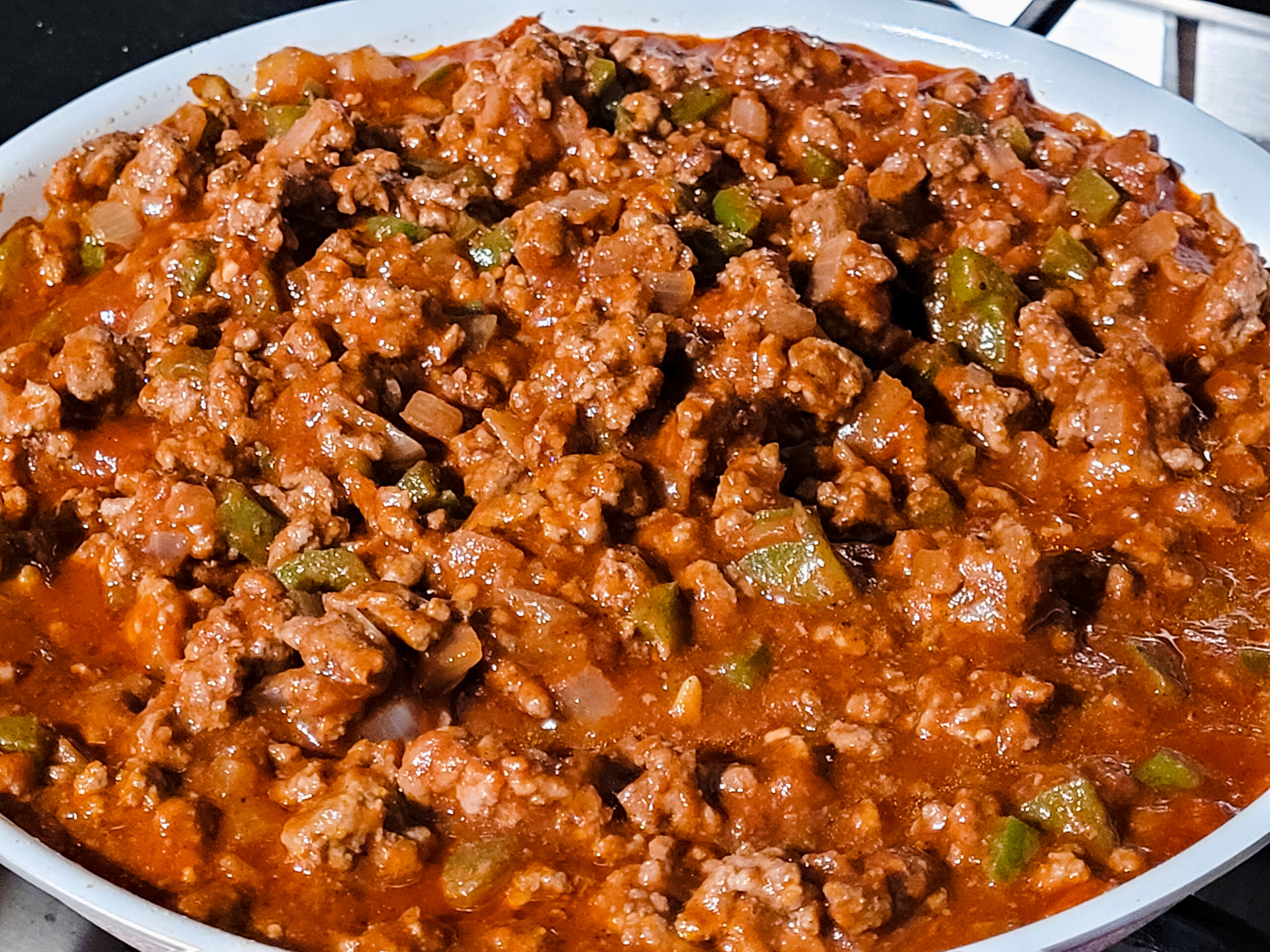 Sloppy Joes from Scratch Pour sauce over ground beef, stir, and warm.