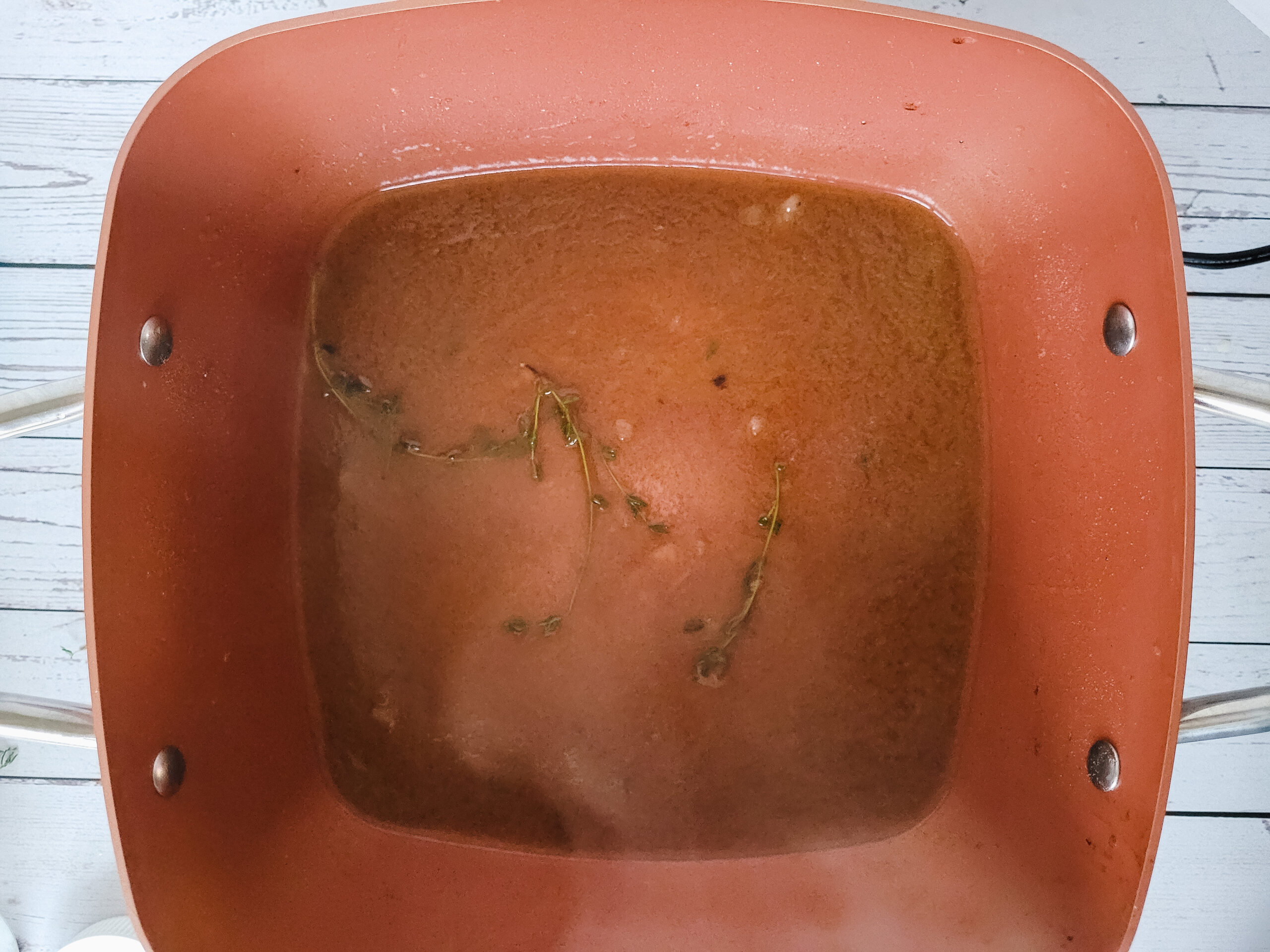 Browned Butter Sauce with Thyme Stir in the white wine and thyme.