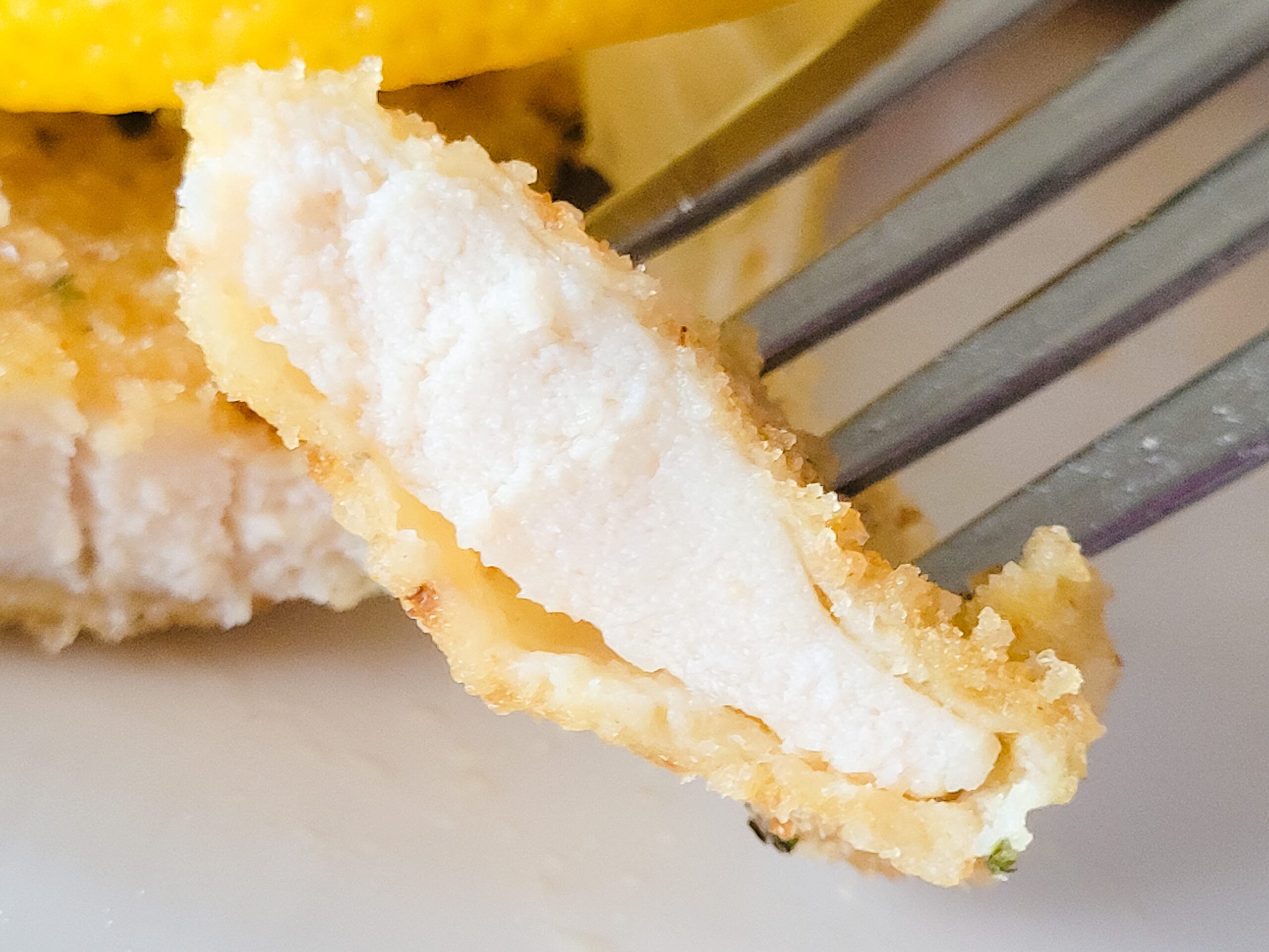 Air Fried Chicken Milanese Serve with lemon wedges.