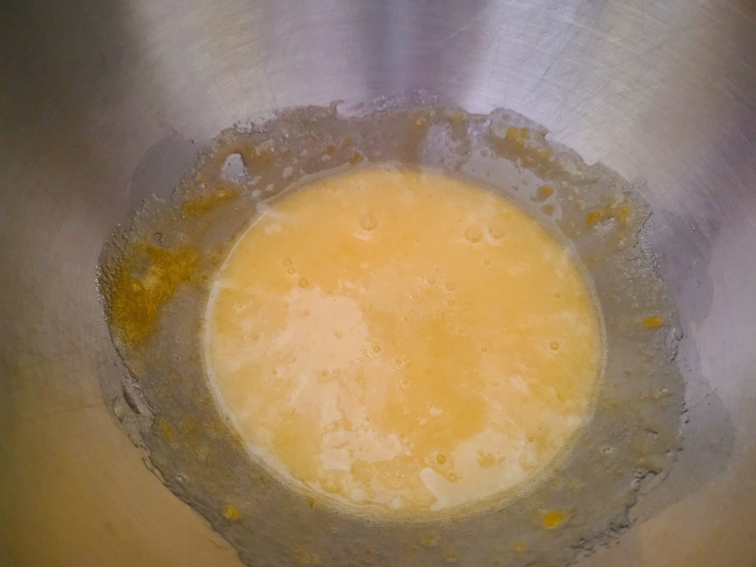 Making Pistachio Cookies Beat together egg and sugar until it's light and fluffy.