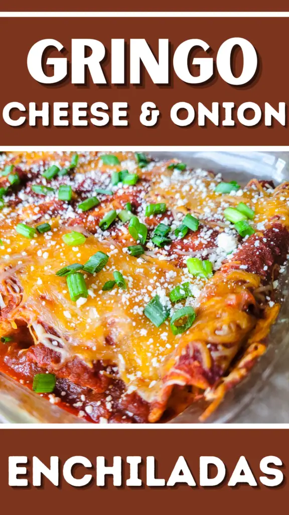 A glass baking dish of hot cheese and onion enchiladas, topped with sliced green onions and topped with crumbled cotija cheese.